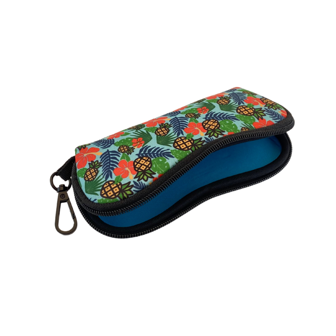 Frogglez goggles neoprene swim goggle case with Elvis Burrows Hawaiian patterns. Perfect pouch to store Frogglez Goggles. Made from durable neoprene. Sturdy zipper stands up to harsh pool environments. Lightweight at 2 oz, easily attach to your swim bag or backpack. Measures 7.25" long x 3.25" wide. Machine washable.