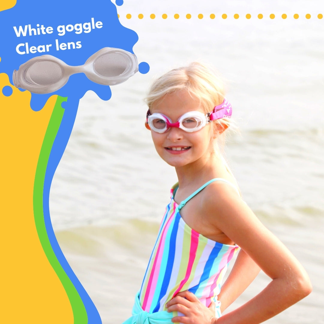 Girl stands in a lake wearing pink rhinestone Frogglez swim goggles with pink nose bridge. Text reads white goggle with clear lens.