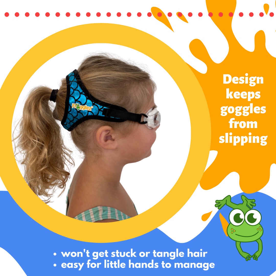 Blonde girl with a ponytail wearing Frogglez sharks swim goggles facing sideways. Text reads: Design keeps goggles from slipping, won't get stuck or tangle hair, easy for little hands to manage.